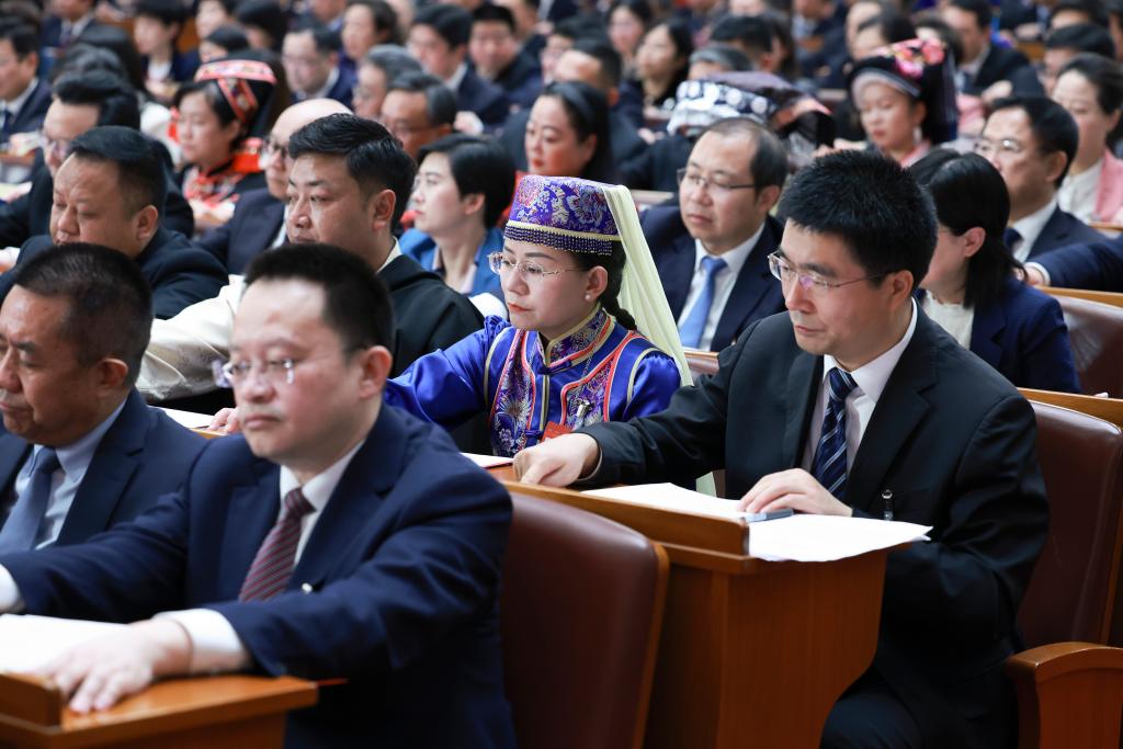 3月11日，第十四屆全國人民代表大會第二次會議在北京人民大會堂舉行閉幕會。新華社記者 王曄 攝