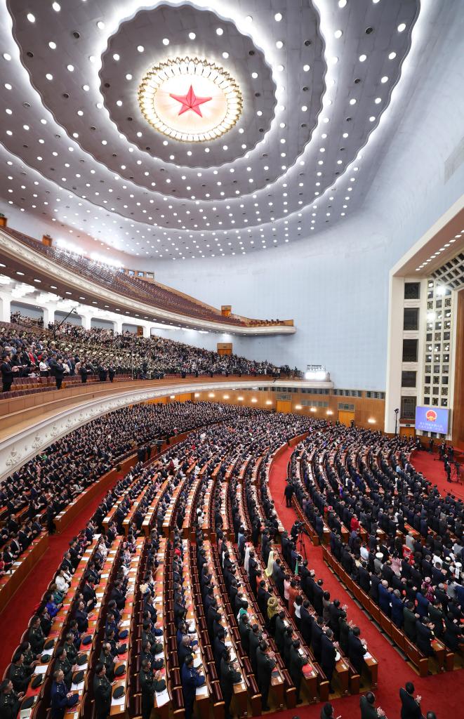 3月11日，第十四屆全國人民代表大會第二次會議在北京人民大會堂舉行閉幕會。新華社記者 丁林 攝